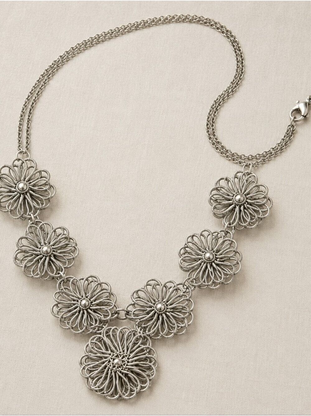 SILVER TONE FLORAL WIRE STATEMENT SCULPTURAL BIB NECKLACE